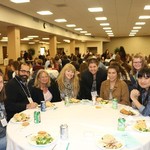 A group enjoying dinner at the Michigan Writing Centers Association
